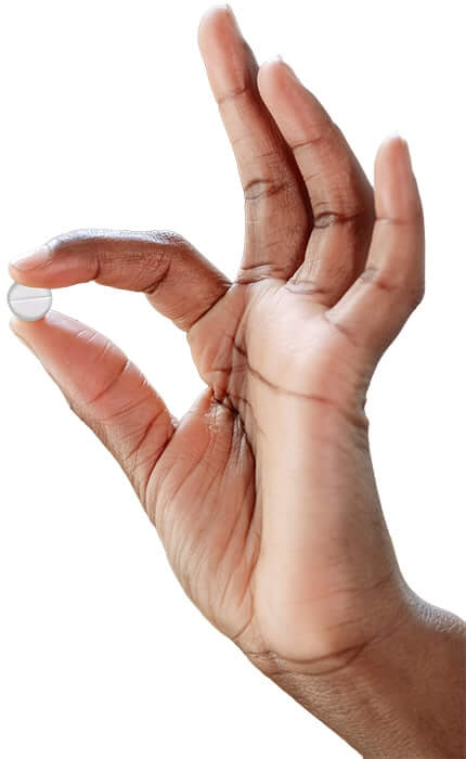 hand holding a pill